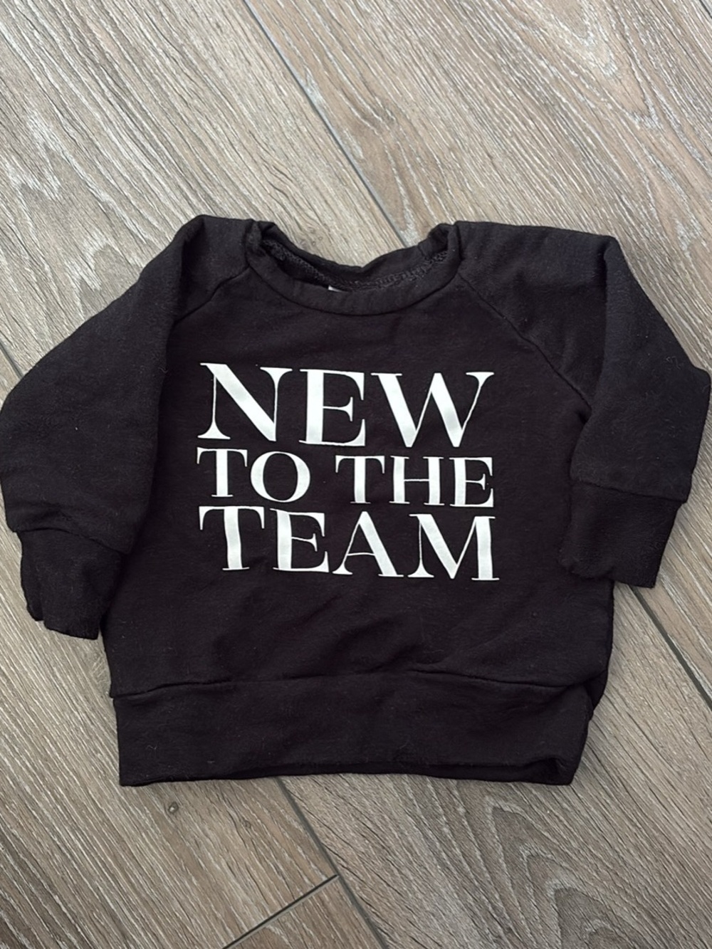Posh Cozy Black Sweatshirt with White "NEW TO THE TEAM" Print